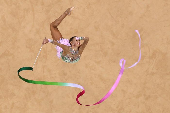 Фоторепортаж о выступлении Евгении Канаевой в финале олимпийских соревнований по художественной гимнастике. Фото: Jamie Squire / Getty Images